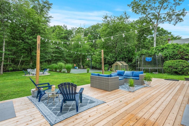 24 Canvasback Ln, East Quogue, NY 11942 - wooden deck featuring an outdoor living space and a yard