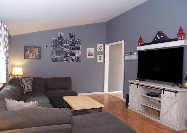 5 Windham Ln, Ronkonkoma, NY 11779 - living area featuring lofted ceiling and light wood-type flooring