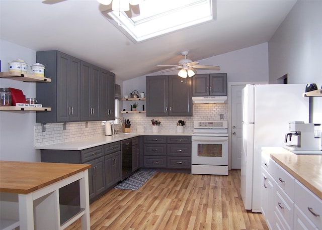 5 Windham Ln, Ronkonkoma, NY 11779 - kitchen with open shelves, white appliances, a ceiling fan, under cabinet range hood, and a skylight