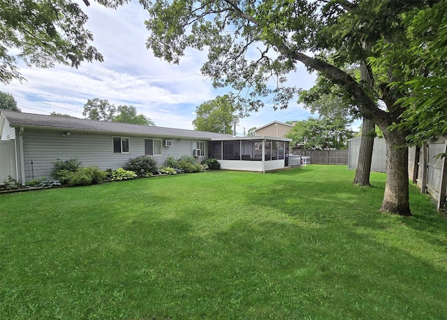 5 Windham Ln, Ronkonkoma, NY 11779 - fenced yard featuring a sunroom