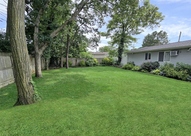 5 Windham Ln, Ronkonkoma, NY 11779 - fenced backyard featuring a wall mounted AC