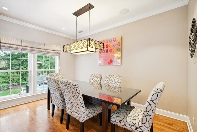 28 The Mews, Syosset, NY 11791 - dining room with crown molding, light wood-style floors, and recessed lighting