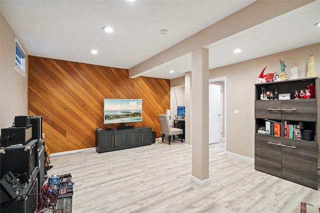 28 The Mews, Syosset, NY 11791 - living area with wood walls, light wood-style floors, and recessed lighting