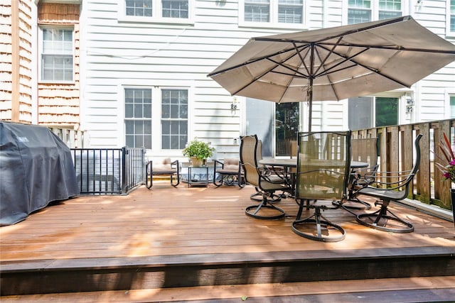 28 The Mews, Syosset, NY 11791 - wooden terrace featuring area for grilling and outdoor dining area