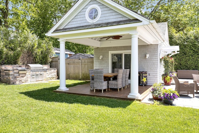 3120 Grathwohl Rd, New Suffolk, NY 11956 - view of outdoor structure with an outdoor kitchen and outdoor dining space