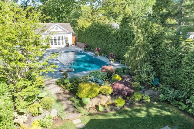 3120 Grathwohl Rd, New Suffolk, NY 11956 - outdoor pool featuring french doors and an exterior structure