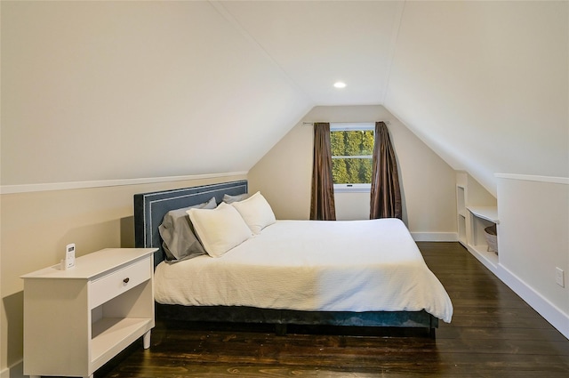 3120 Grathwohl Rd, New Suffolk, NY 11956 - bedroom with dark wood-style floors and lofted ceiling