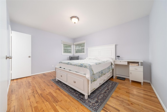 98 Virginia Ave, Plainview, NY 11803 - bedroom featuring light wood-style flooring and baseboards