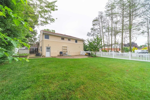 98 Virginia Ave, Plainview, NY 11803 - rear view of property with a patio area and brick siding