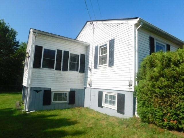 967 State Route 17k, Montgomery, NY 12549 - rear view of property with a lawn and board and batten siding