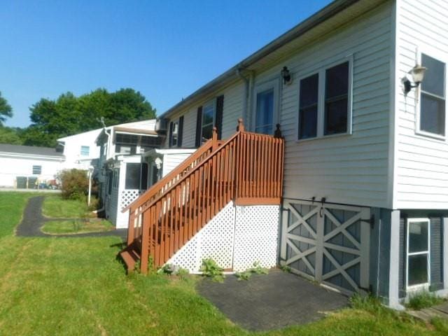 967 State Route 17k, Montgomery, NY 12549 - back of house with a lawn and stairway