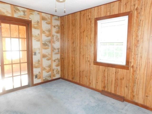 967 State Route 17k, Montgomery, NY 12549 - carpeted spare room featuring wood walls