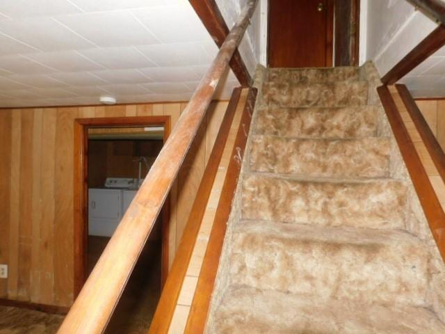 967 State Route 17k, Montgomery, NY 12549 - staircase featuring separate washer and dryer and wood walls