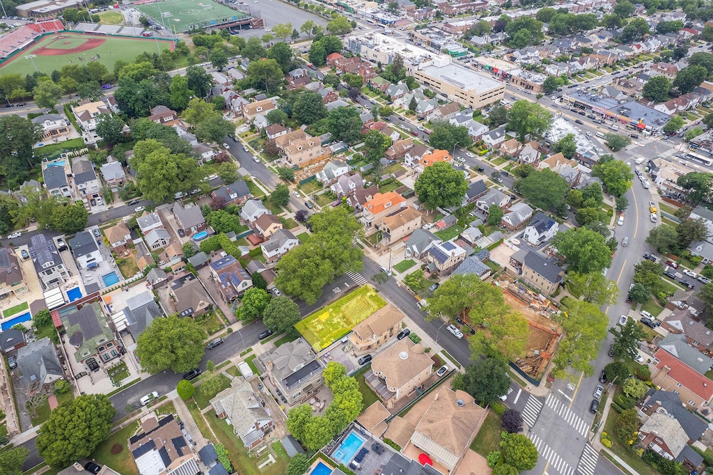179-04 80th Dr, Jamaica Estates, NY 11432 - aerial view of property and surrounding area featuring nearby suburban area
