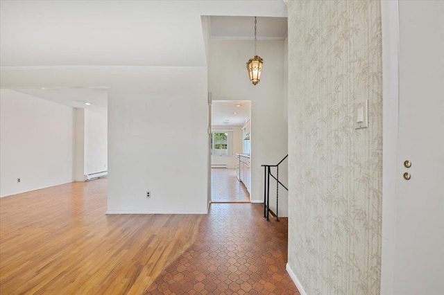 20 Deb St, Plainview, NY 11803 - entrance foyer with crown molding, baseboard heating, a chandelier, and wood finished floors