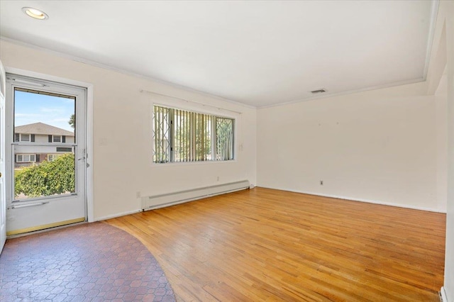 20 Deb St, Plainview, NY 11803 - unfurnished room featuring a baseboard radiator, ornamental molding, light wood-type flooring, and recessed lighting