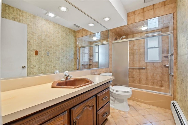 20 Deb St, Plainview, NY 11803 - bathroom with a baseboard heating unit, vanity, tile patterned floors, shower / bath combination with glass door, and recessed lighting