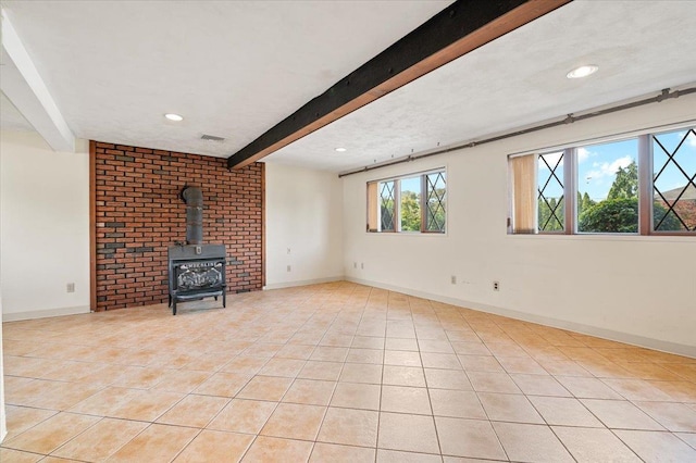 20 Deb St, Plainview, NY 11803 - unfurnished living room with beam ceiling, a wood stove, light tile patterned floors, and recessed lighting
