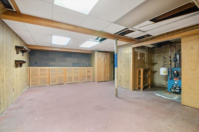 20 Deb St, Plainview, NY 11803 - basement with wooden walls and a heating unit