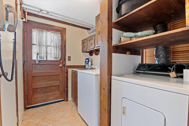 20 Deb St, Plainview, NY 11803 - laundry room featuring light tile patterned floors and washer and clothes dryer