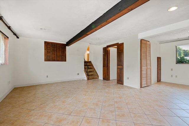 20 Deb St, Plainview, NY 11803 - unfurnished living room with beam ceiling, light tile patterned floors, stairs, and recessed lighting