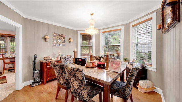 20 Overhill Pl, Yonkers, NY 10704 - dining area featuring crown molding, plenty of natural light, and light wood finished floors