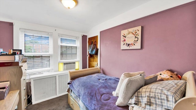 20 Overhill Pl, Yonkers, NY 10704 - carpeted bedroom with radiator, lofted ceiling, and cooling unit