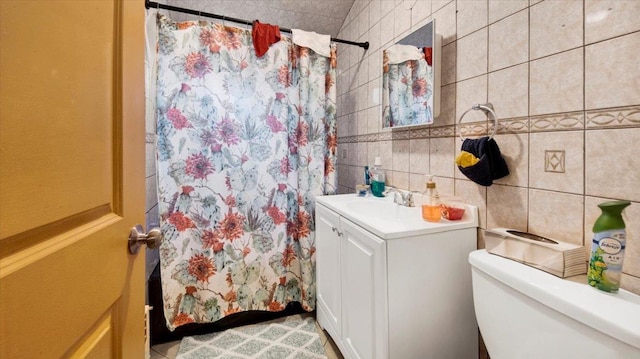 20 Overhill Pl, Yonkers, NY 10704 - full bath with vanity, a shower with curtain, and tile walls
