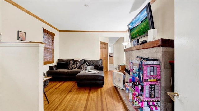 20 Overhill Pl, Yonkers, NY 10704 - living area with a tiled fireplace, wood finished floors, and ornamental molding