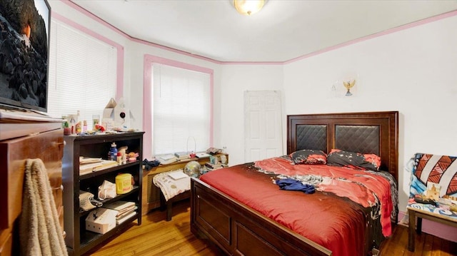 20 Overhill Pl, Yonkers, NY 10704 - bedroom featuring wood finished floors and crown molding