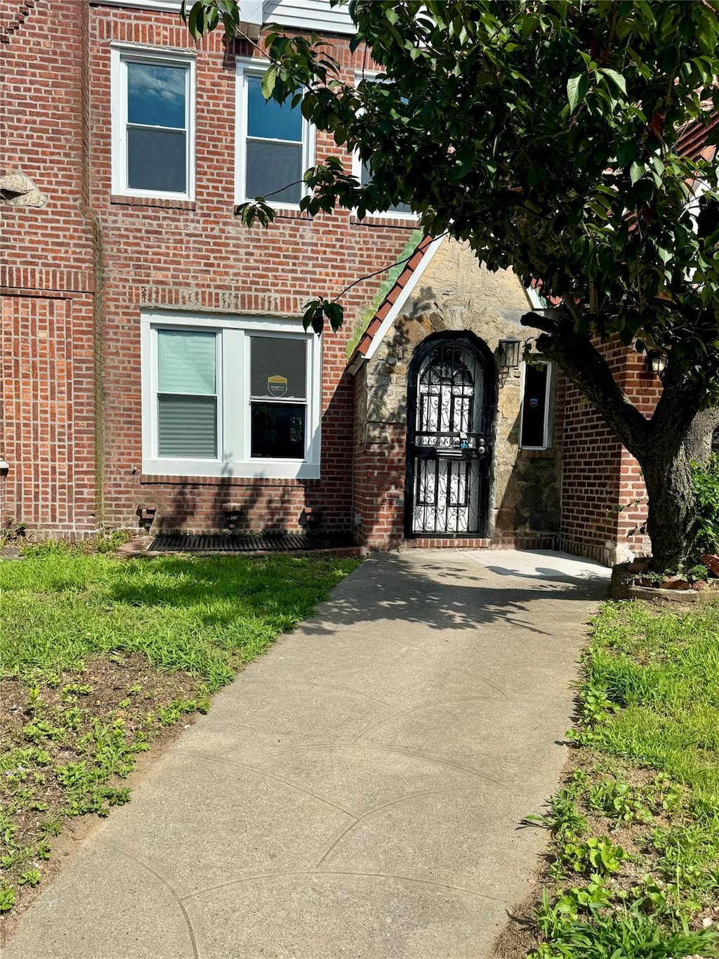 17955 Anderson Rd, Jamaica, NY 11434 - view of front of house with brick siding and driveway