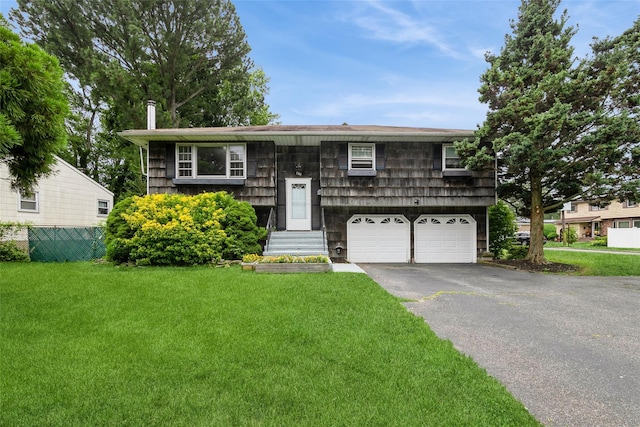 180 Hunter Ave, North Babylon, NY 11703 - raised ranch with driveway and a garage