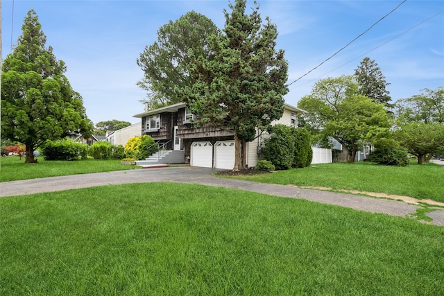 180 Hunter Ave, North Babylon, NY 11703 - view of front of property with asphalt driveway, a garage, a front yard, and stairs