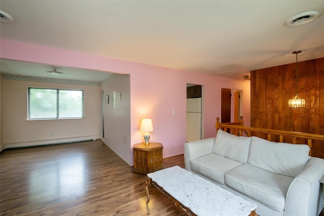 180 Hunter Ave, North Babylon, NY 11703 - living room with baseboard heating and wood finished floors