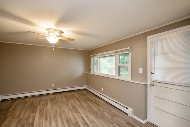 180 Hunter Ave, North Babylon, NY 11703 - empty room with baseboard heating, a ceiling fan, wood finished floors, and crown molding