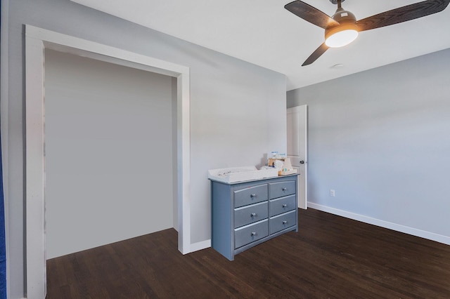 15 Aron Dr, Bohemia, NY 11716 - bedroom with dark wood-style floors and a ceiling fan