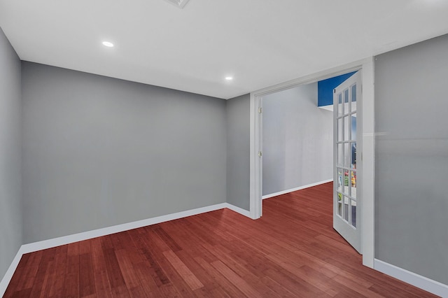 15 Aron Dr, Bohemia, NY 11716 - spare room featuring wood finished floors and recessed lighting