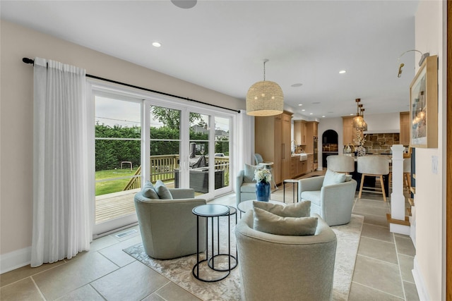 52 Concourse E, Brightwaters, NY 11718 - living room with recessed lighting and light tile patterned floors