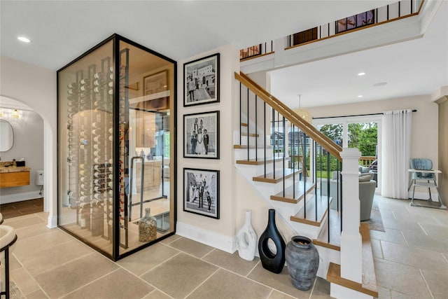 52 Concourse E, Brightwaters, NY 11718 - wine area with arched walkways and recessed lighting