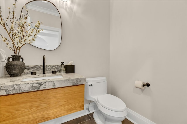 52 Concourse E, Brightwaters, NY 11718 - half bathroom with tile patterned flooring, vanity, and ornamental molding
