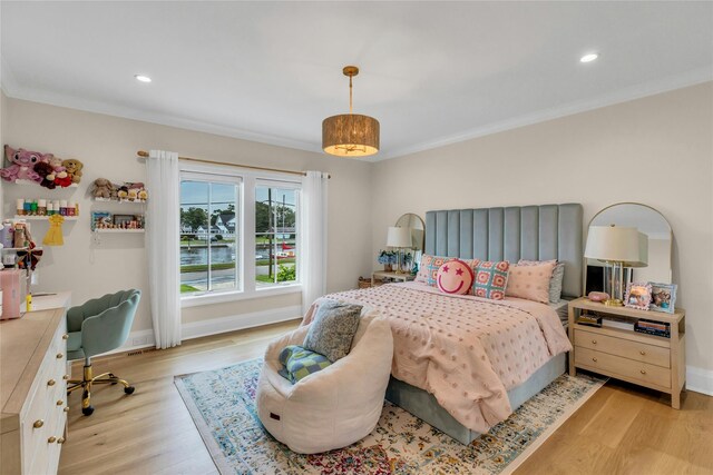 52 Concourse E, Brightwaters, NY 11718 - bedroom with light wood finished floors, recessed lighting, and crown molding