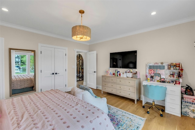 52 Concourse E, Brightwaters, NY 11718 - bedroom featuring ornamental molding, wood finished floors, and recessed lighting