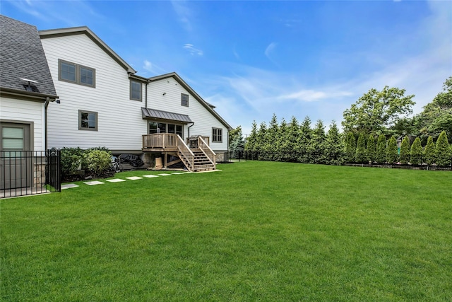 52 Concourse E, Brightwaters, NY 11718 - fenced backyard featuring stairway and a deck