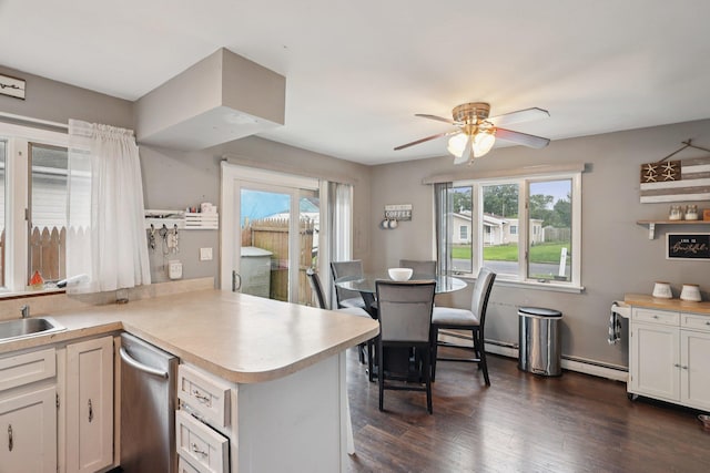 17 Lombardy Dr, Shirley, NY 11967 - kitchen with light countertops, dishwasher, a ceiling fan, a peninsula, and a baseboard radiator