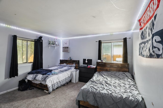 17 Lombardy Dr, Shirley, NY 11967 - carpeted bedroom featuring multiple windows and a wall mounted air conditioner