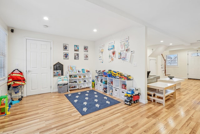 652 Arthur St, Baldwin Harbor, NY 11510 - recreation room featuring wood finished floors and recessed lighting