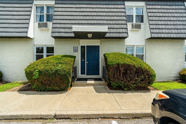 14 E White Gate Rd, Wappingers Falls, NY 12590 - entrance to property featuring brick siding and mansard roof