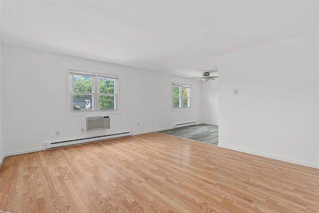 14 E White Gate Rd, Wappingers Falls, NY 12590 - spare room with a baseboard radiator, wood finished floors, a wall unit AC, and ceiling fan