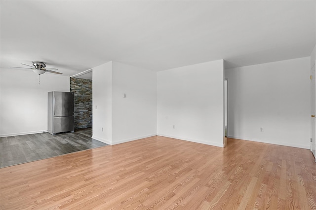 14 E White Gate Rd, Wappingers Falls, NY 12590 - unfurnished living room featuring a ceiling fan and wood finished floors