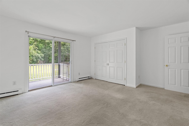 14 E White Gate Rd, Wappingers Falls, NY 12590 - unfurnished bedroom featuring access to exterior, baseboard heating, and carpet